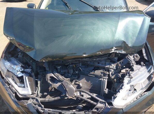 5N1AT2MV9KC746313 2019 NISSAN ROGUE Зеленый Вид сзади
