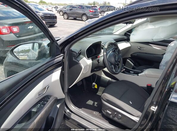 5NMJB3AE3PH202061 2023 HYUNDAI TUCSON Черный Вид салона спереди