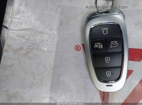 5NMJBCAE4PH263953 2023 HYUNDAI TUCSON Red Առջևի վահանակի տեսք