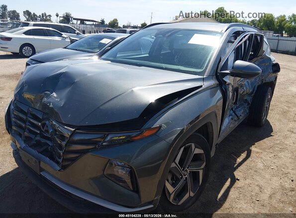 5NMJCCAE8NH018275 2022 HYUNDAI TUCSON Gray Vista tres cuartos delantera izquierda