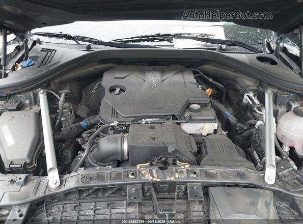 5NMMADTB4RH006674 2024 GENESIS GV70 Black უკანა ხედი