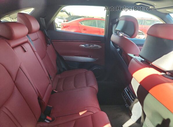 5NMMFDTBXTH055709 2026 GENESIS GV70 Red Rear seats view
