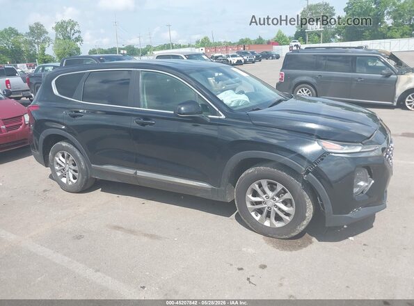 5NMS23AD6KH030807 2019 HYUNDAI SANTA FE Black Rear interior view