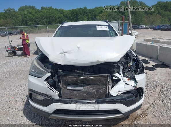 5NMZU3LB4JH064263 2018 HYUNDAI SANTA FE SPORT White Vista interior trasera