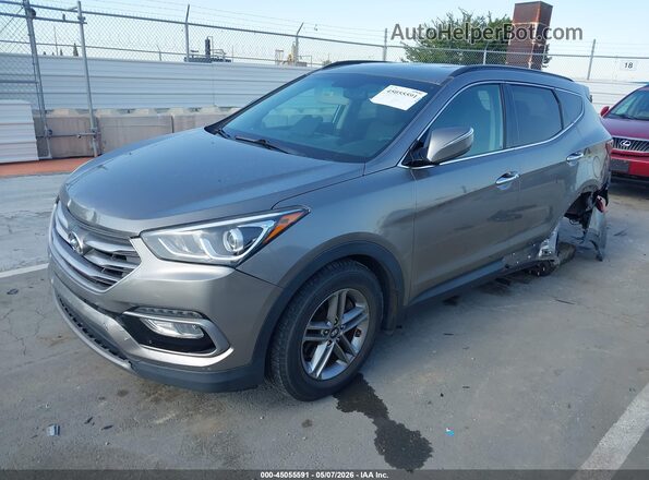 5NMZU3LB7HH040677 2017 HYUNDAI SANTA FE SPORT Silver Vista tres cuartos delantera izquierda