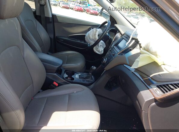 5NMZUDLBXHH025502 2017 HYUNDAI SANTA FE SPORT Tan წინა სალონის ხედი