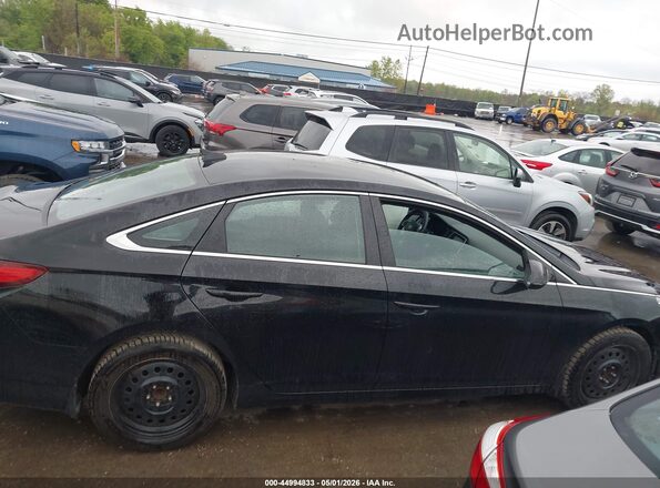 5NPE24AF2KH807118 2019 HYUNDAI SONATA Black Вид задньої частини салону