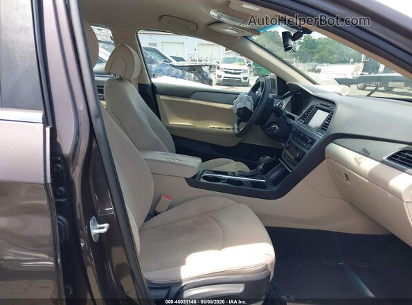 5NPE24AF3GH331825 2016 HYUNDAI SONATA Dark Brown Vista interior delantera
