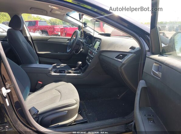 5NPE24AF4KH730719 2019 HYUNDAI SONATA Black Front interior view