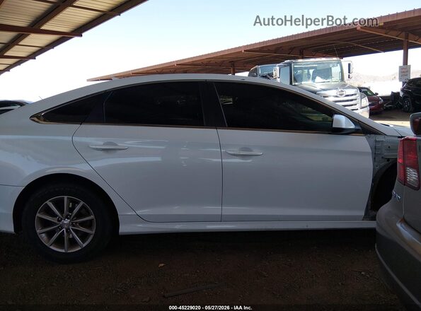 5NPE24AF5JH703396 2018 HYUNDAI SONATA White Rear interior view