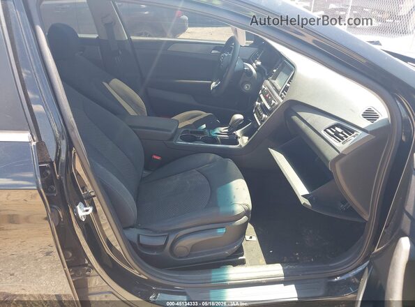 5NPE24AF6KH746338 2019 HYUNDAI SONATA Black წინა სალონის ხედი