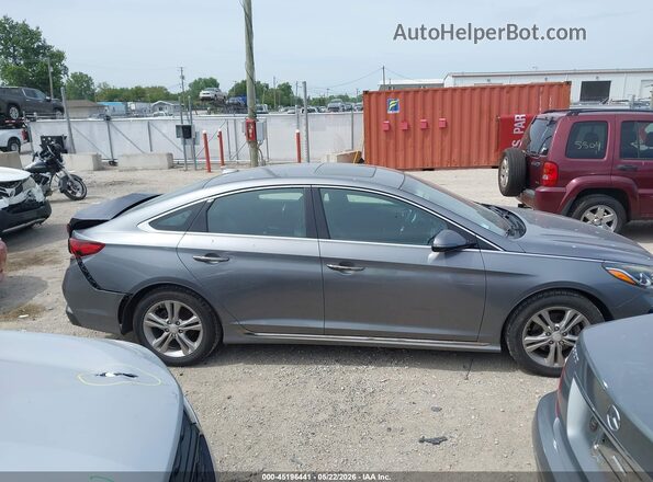 5NPE34AF3JH670282 2018 HYUNDAI SONATA Gray Widok wnętrza z tyłu