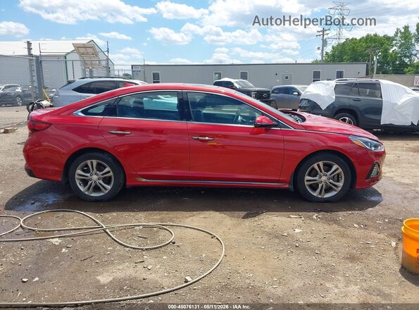 5NPE34AF3KH755754 2019 HYUNDAI SONATA Red Rear interior view