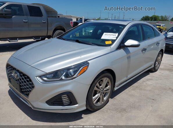 5NPE34AF4KH813192 2019 HYUNDAI SONATA Серебряный Передняя левая четверть
