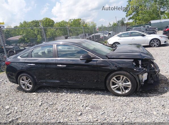 5NPE34AF5JH617325 2018 HYUNDAI SONATA Черный Вид задней части салона