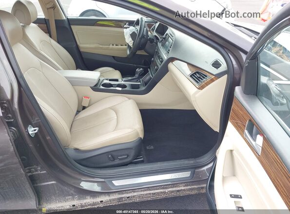 5NPE34AF6GH415103 2016 HYUNDAI SONATA Brown Front interior view