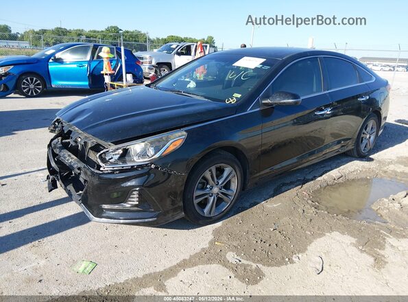 5NPE34AF6JH606351 2018 HYUNDAI SONATA Black Vista tres cuartos delantera izquierda