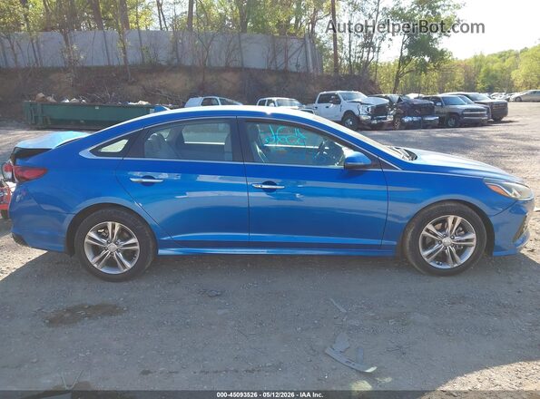 5NPE34AF7JH661570 2018 HYUNDAI SONATA Blue Вид задньої частини салону