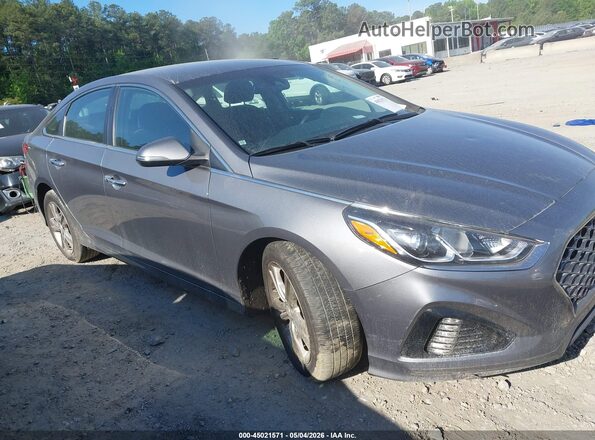 5NPE34AF7KH761153 2019 HYUNDAI SONATA Gray Սալոնի հետևի տեսք