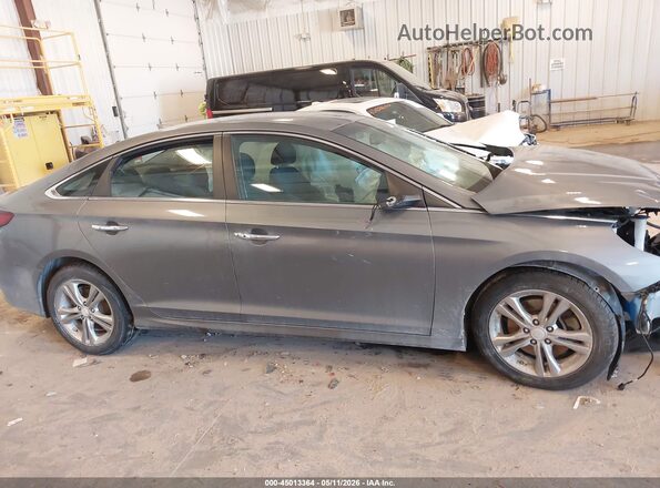 5NPE34AF9JH665538 2018 HYUNDAI SONATA Gray Rear interior view