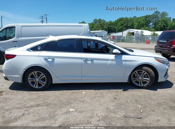 5NPE34AF9JH694375 2018 HYUNDAI SONATA White Widok wnętrza z tyłu