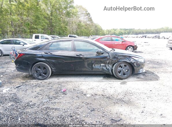 5NPLM4AG7PH100386 2023 HYUNDAI ELANTRA Black Widok wnętrza z tyłu