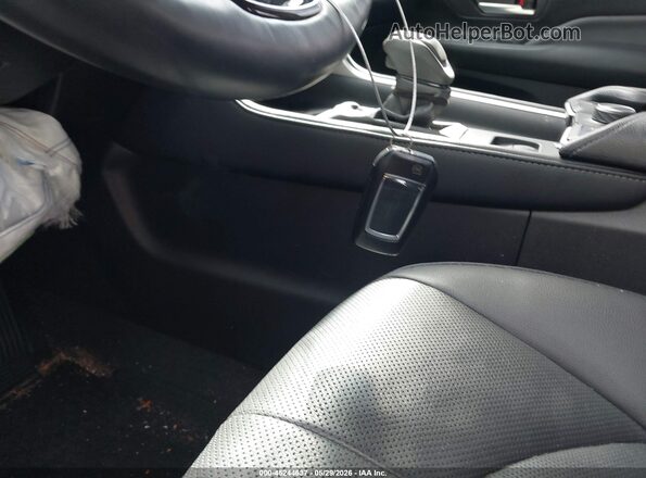 5TDAAAB52RS030661 2024 TOYOTA GRAND HIGHLANDER Burgundy Vista del salpicadero