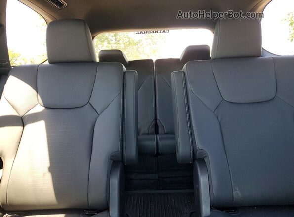 5TDAAAB65SS028899 2025 LEXUS TX White Vista de los asientos traseros