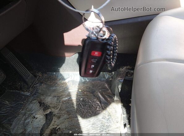 5TDGZRAH6MS037604 2021 TOYOTA LE Beige Widok deski rozdzielczej