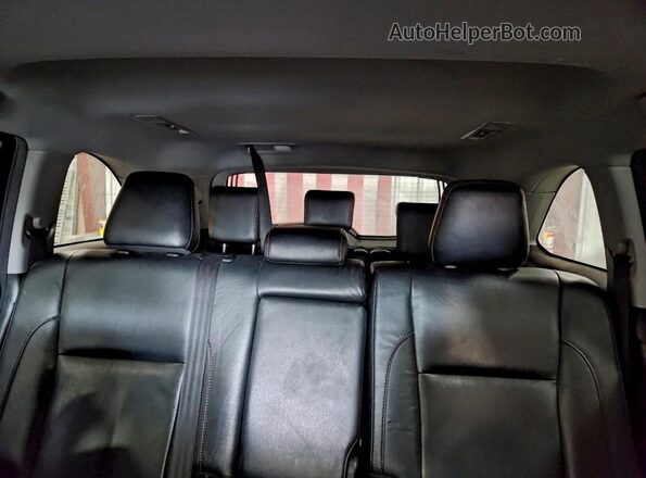 5TDJZRFH6JS880566 2018 TOYOTA HIGHLANDER White Rear seats view