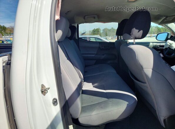 5TFAX5GN5KX147567 2019 TOYOTA TACOMA White Rear seats view