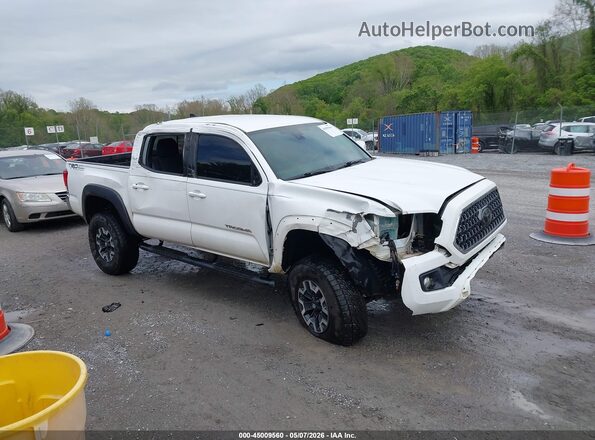 5TFCZ5AN6KX210588 2019 TOYOTA TACOMA Белый Вид задней части салона