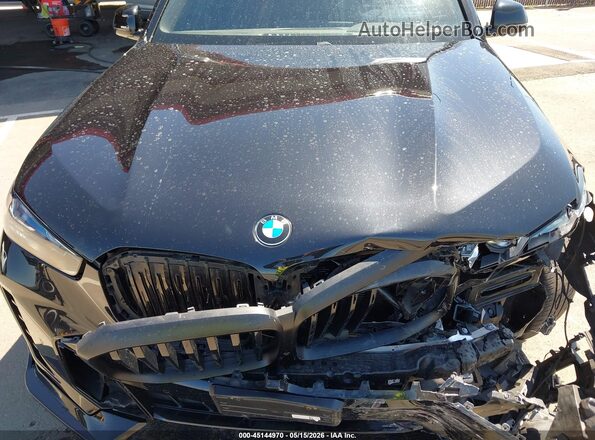 5UX13EU01R9W15439 2024 BMW X5 Black Rear view