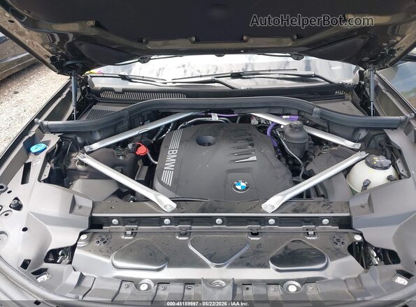 5UX23EM01S9Z59038 2025 BMW X7 Green Widok z tyłu
