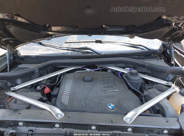 5UX23EM04R9V48453 2024 BMW X7 Black Rear view