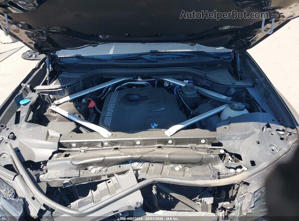 5UX23EM07S9W65594 2025 BMW X7 Black Vista trasera