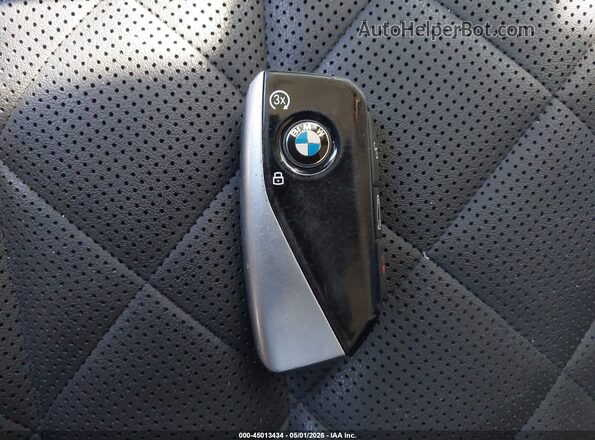 5UX23EM07S9W65594 2025 BMW X7 Black Vista del salpicadero