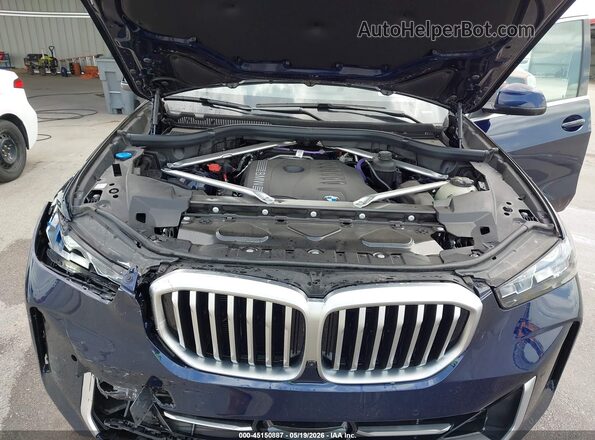 5UX23EU02T9218608 2026 BMW X5 Blue Widok z tyłu