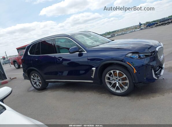 5UX23EU02T9218608 2026 BMW X5 Blue Widok wnętrza z tyłu