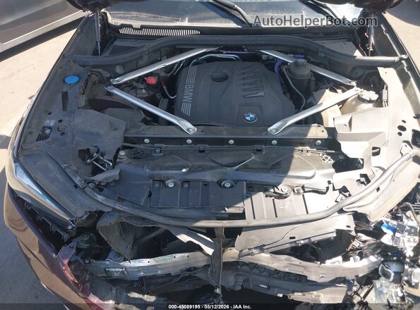 5UX23EU05R9V11802 2024 BMW X5 Burgundy უკანა ხედი