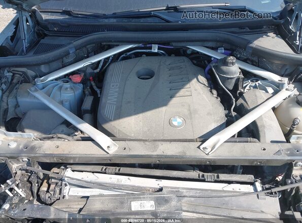 5UX23EU0XR9S62848 2024 BMW X5 Light Blue Rear view
