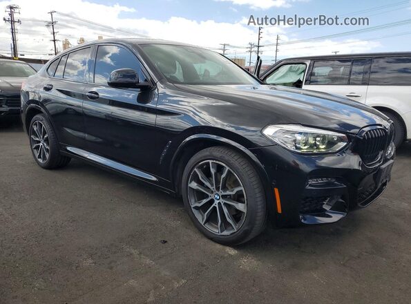 5UX2V1C02L9B14613 2020 BMW X4 Black Front right