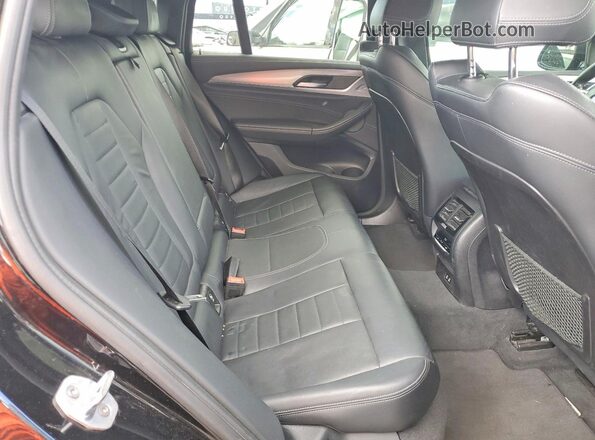 5UX2V1C02L9B14613 2020 BMW X4 Black Rear interior view