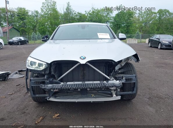 5UX2V1C02LLE68117 2020 BMW X4 Silver Սալոնի հետևի տեսք