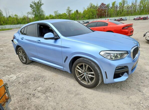 5UX2V1C05L9D00632 2020 BMW X4 Blue Przód prawy