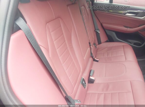 5UX2V5C00L9D29513 2020 BMW X4 Black Vista de la etiqueta del VIN