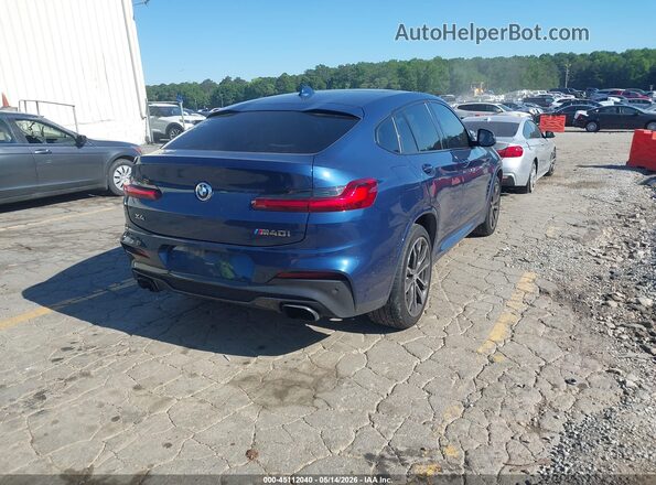 5UX2V5C04L9B53338 2020 BMW X4 Blue Rear right