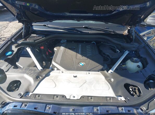 5UX2V5C04L9B53338 2020 BMW X4 Blue Rear view
