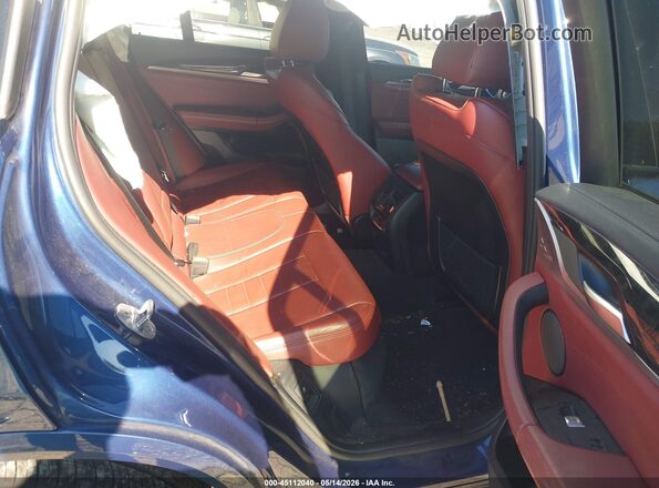 5UX2V5C04L9B53338 2020 BMW X4 Blue VIN sticker view