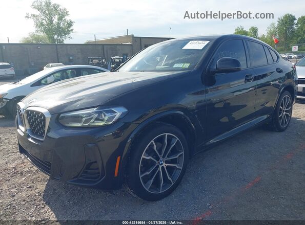 5UX33DT01N9K46483 2022 BMW X4 Black Առջևի ձախ երեք քառորդ տեսարան